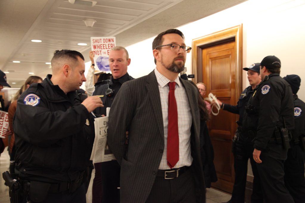 Drew is placed under arrest for disrupting the hearing of Andrew Wheeler for EPA Administrator