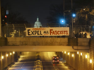 Activists Demand Congress Expel Fascists with Sign