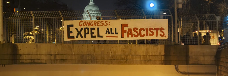Activists Demand Congress Expel Fascists with Sign